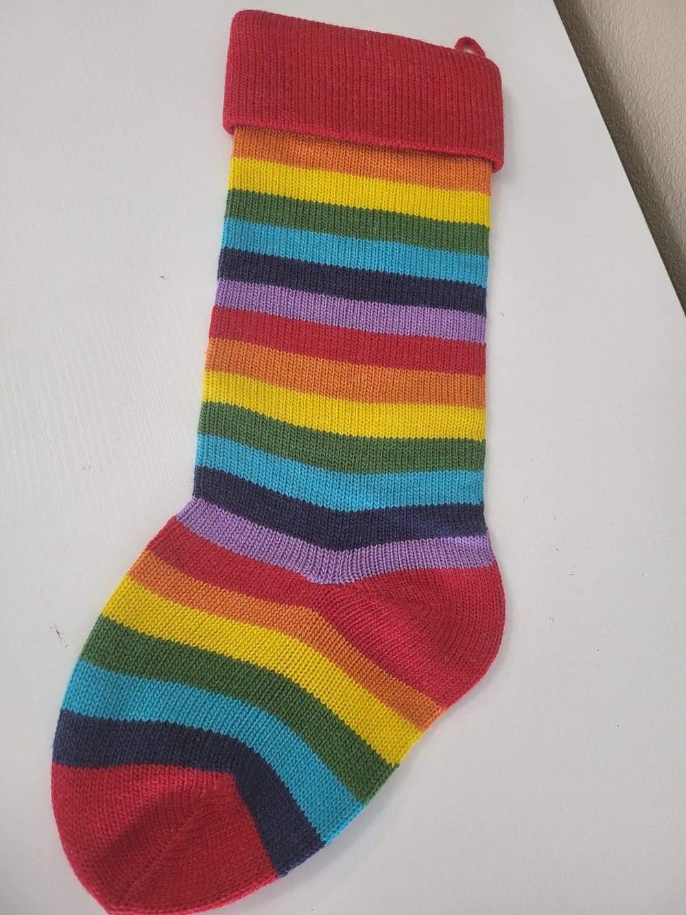 World Market Rainbow Stripe Knit Holiday Stocking - Red Cuff